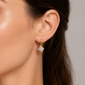 18K Gold-Plated Round CZ Huggie Hoop - model wearing earrings