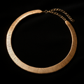 18K Gold-Plated Omega Ribbed Collar Necklace on velvet