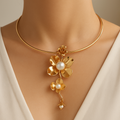 18K Gold-Plated Open Wire Collar with Floral Bloom on model